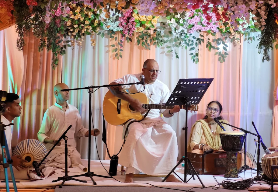 Hari Rupa Das leading kirtan with the ensemble